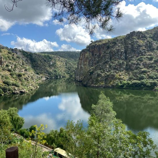 Image of the cliffs of Douro Internacional on a beautiful sunny day between clouds